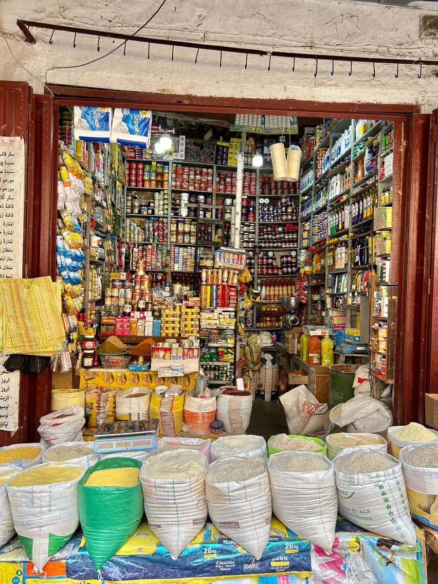 A neighborhood provision shop with packed shelves